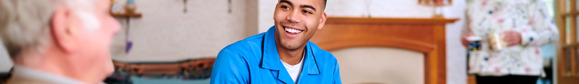 Home-Services-Consulant-Advising-Senior-Couple-GettyImages-1132148246